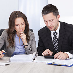 Accountant and tax agent providing tax advice to a client.